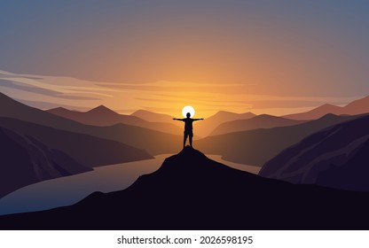 Traveler standing on the hill top at sunset