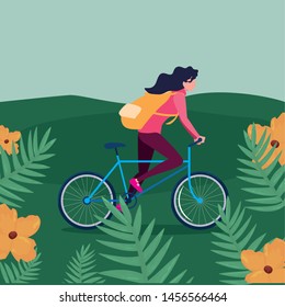 traveler woman with bag riding bicycle