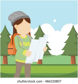 traveller girl using map in forest