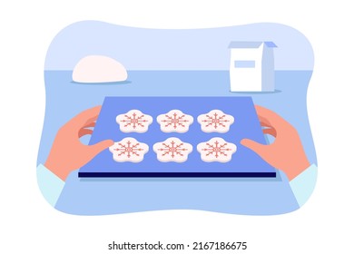 Tray with homemade cookies in hands flat vector illustration. Man making festive biscuits in shape of snowflake. Cooking, holiday concept for banner, website design or landing web page