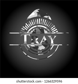 Tray on grey camouflage texture