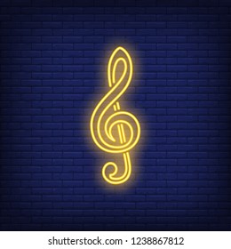 Treble clef neon sign. Classical music, concert or advertisement design. Night bright neon sign, colorful billboard, light banner. Vector illustration in neon style.