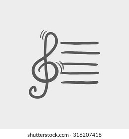 Treble clef sketch icon for web, mobile and infographics. Hand drawn vector dark grey icon isolated on light grey background.