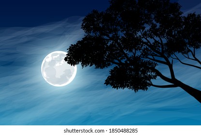Tree against night sky with full moon