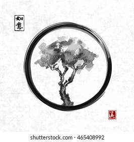 Tree in black enso zen circle on rice paper background. Traditional Japanese ink painting sumi-e. Contains hieroglyphs - dreams come true, nature, beauty