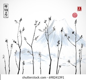 Tree branches with fresh leaves and Fujiyama mountain on background. Traditional oriental ink painting sumi-e, u-sin, go-hua. Contains hieroglyphs - zen, freedom, nature, beauty.