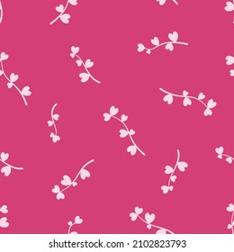 Ramas arbóreas con forma de corazón hojas sobre fondo rosado. Patrón sin foco. Tema del Día de San Valentín. Ilustración vectorial.