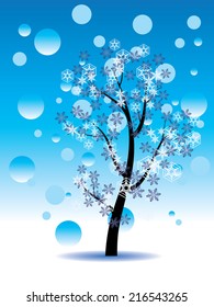 Tree with decorative snowflakes, abstract winter background. 