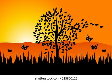 Tree and falling leaves - autumn