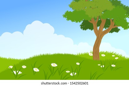 tree in grass field with cloudy sky