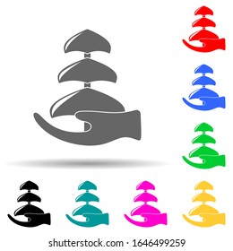 icono de estilo multicolor de árbol en la mano. Glifo simple, vector plano de iconos de seguros para ui y ux, sitio web o aplicación móvil