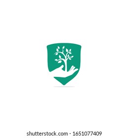 Tree in hand vector logo design. Natural products logo.