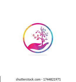 Tree in hand vector logo design. Natural products logo. Hand tree logo design