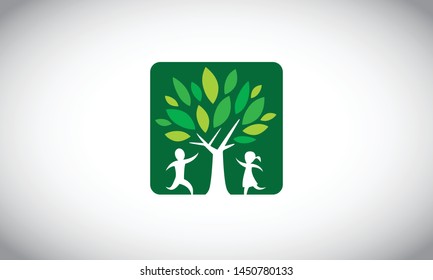 Tree with happy child school logo
