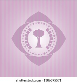 tree icon inside badge with pink background
