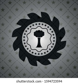 tree icon inside black emblem