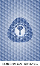 tree icon inside blue badge with geometric pattern.