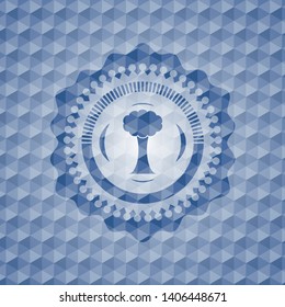 tree icon inside blue badge with geometric pattern.
