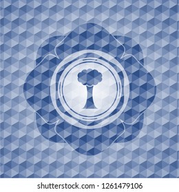 tree icon inside blue emblem or badge with abstract geometric pattern background.