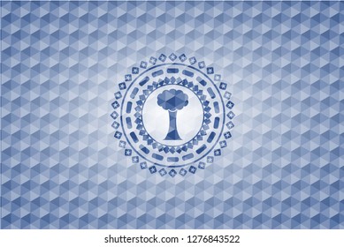 tree icon inside blue emblem with geometric background.