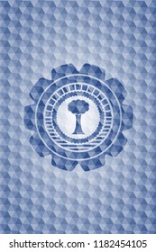 tree icon inside blue hexagon emblem.