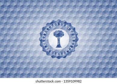 tree icon inside blue hexagon emblem.
