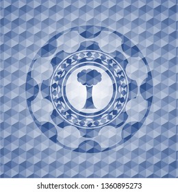 tree icon inside blue hexagon emblem.