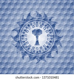 tree icon inside blue hexagon emblem.
