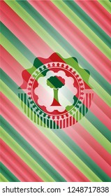 tree icon inside christmas badge background.