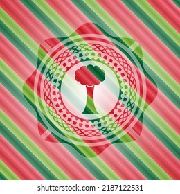 tree icon inside christmas badge background. 