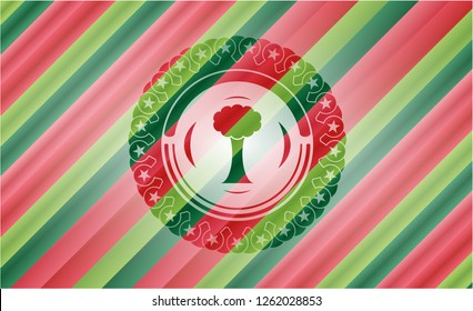 tree icon inside christmas emblem.
