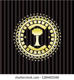 tree icon inside gold emblem or badge
