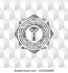 tree icon inside grey badge with geometric cube white background
