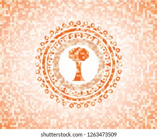 tree icon inside orange mosaic emblem