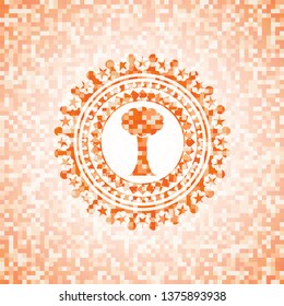 tree icon inside orange mosaic emblem