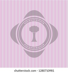 tree icon inside pink icon or emblem