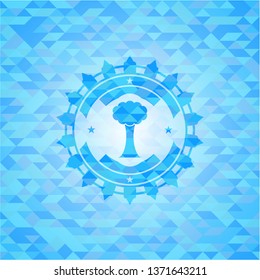tree icon inside realistic sky blue mosaic emblem