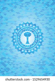 tree icon inside realistic sky blue mosaic emblem
