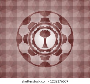 tree icon inside red seamless geometric badge.