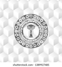 tree icon inside retro style grey emblem with geometric cube white background