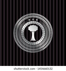 tree icon inside silver badge or emblem