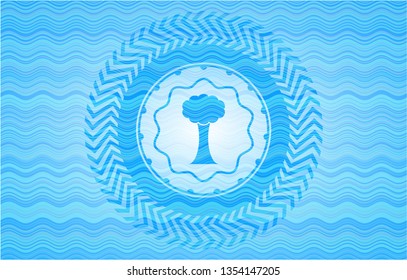 tree icon inside water wave representation emblem background.