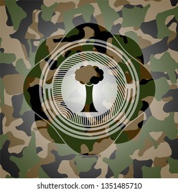 tree icon on camouflage texture