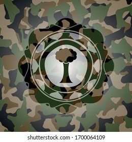 tree icon on camouflage texture