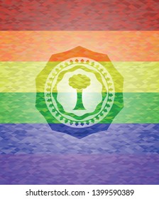 tree icon on mosaic background with the colors of the LGBT flag
