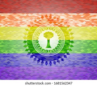 tree icon on mosaic background with the colors of the LGBT flag