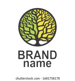 Tree of life logo in a round frame. Two-tone crown of yellow and green colors. Brown branches, trunk, text, words. Icon, sign, symbol, brand identity for agriculture, bio, eco, natural, organic foods.