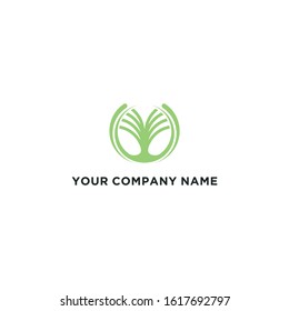 tree logo with tree branches in green