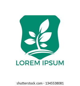 Tree logo design. Minimalist green tree logo symbol. Enviromental health and nature logo.