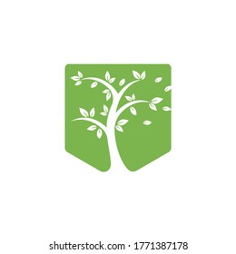 Tree logo design. Minimalist green tree logo symbol. 
